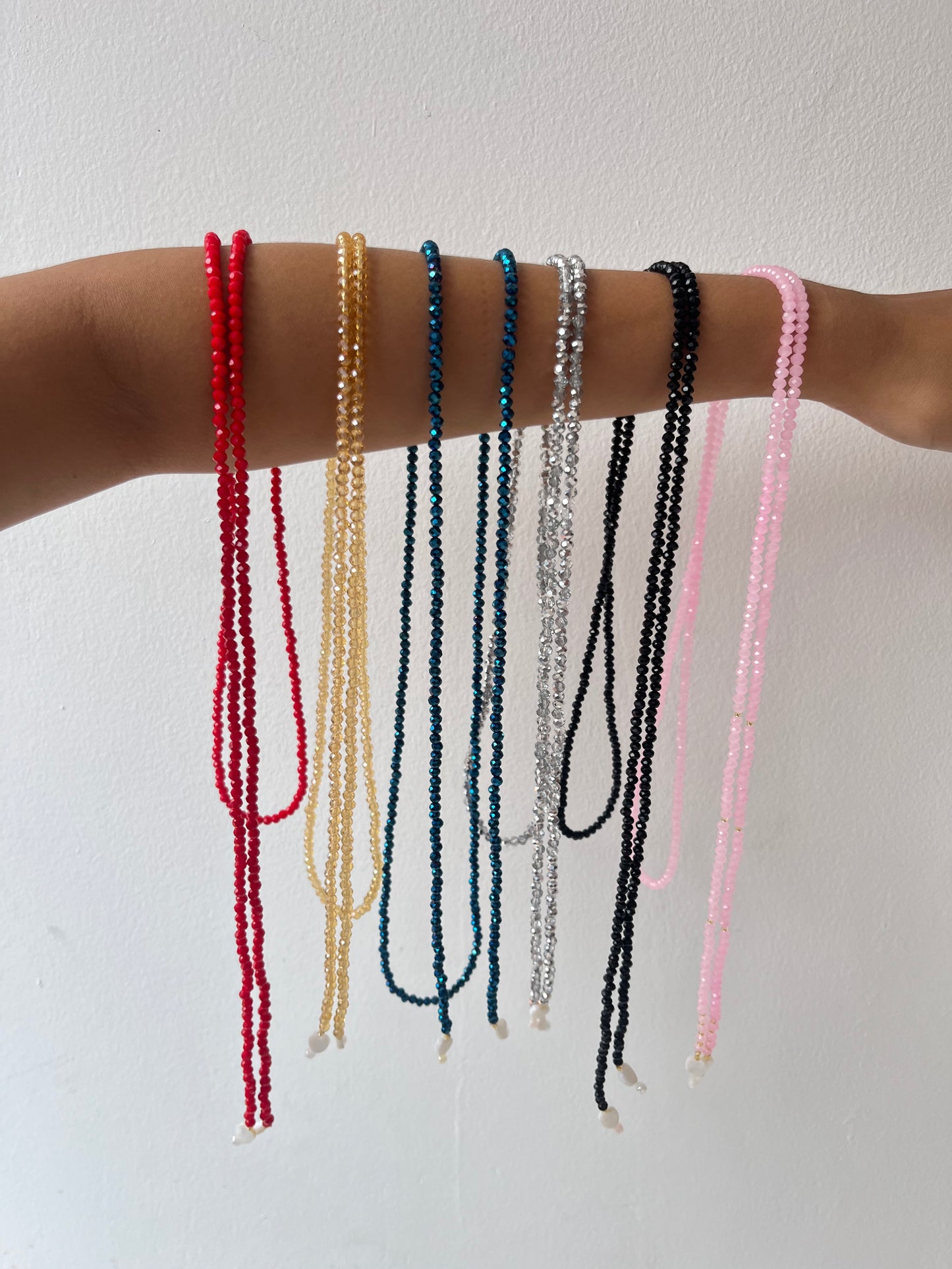 . a Necklaces